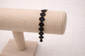 Delicate handmade crochet bracelet with beads and intricate circles. Dark Blue.