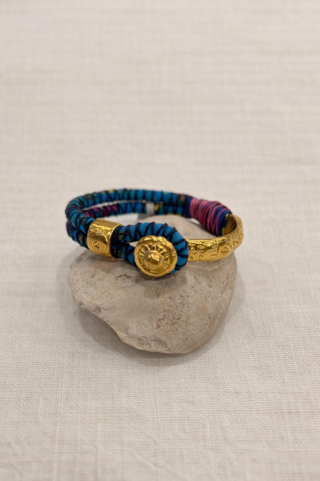 Gold-plated and fabric bracelet. Vintage handcrafted with colorful threads.