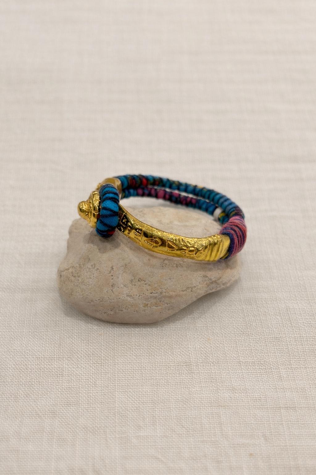 Gold-plated and fabric bracelet. Vintage handcrafted with colorful threads.