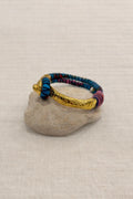Gold-plated and fabric bracelet. Vintage handcrafted with colorful threads.