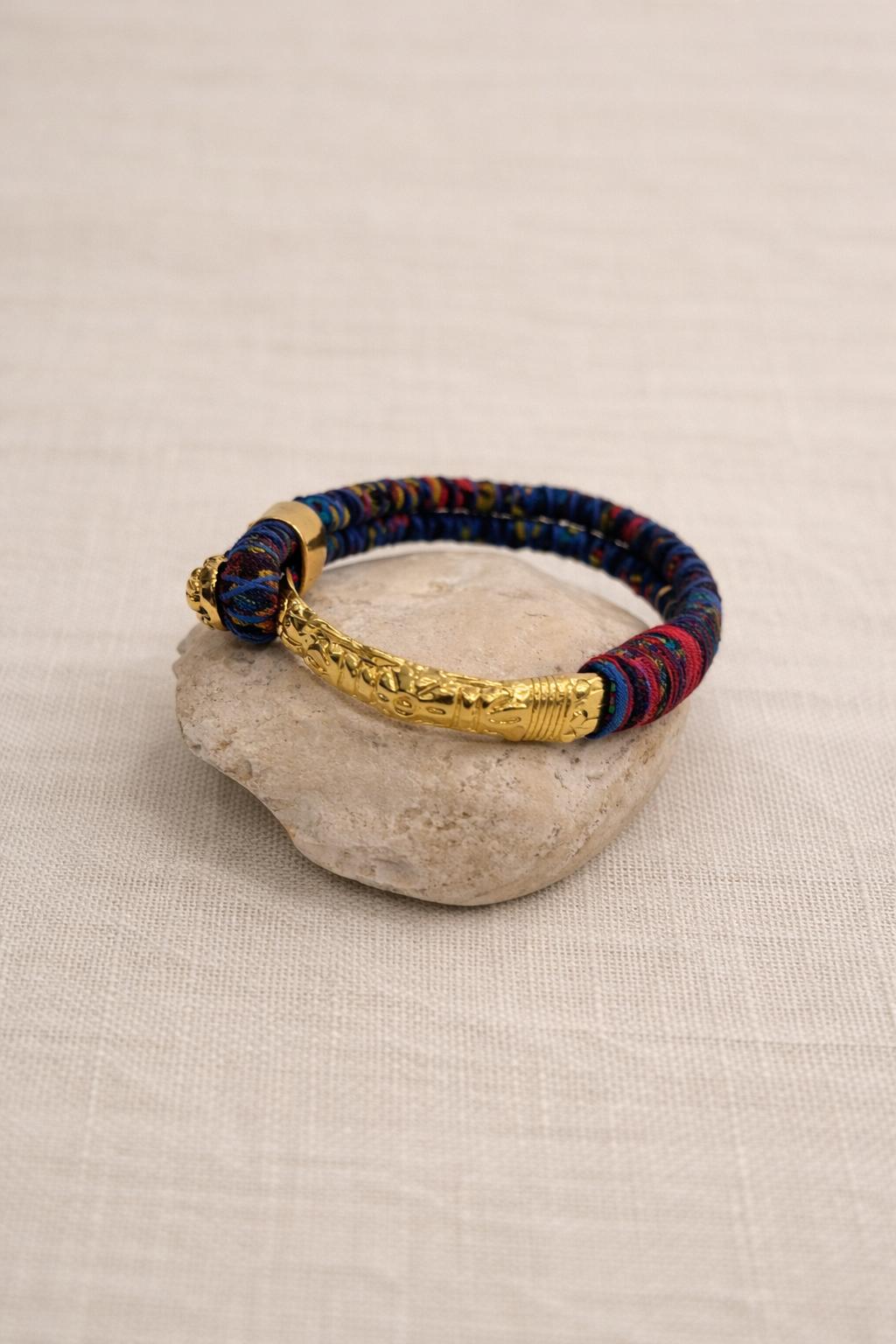 Gold-plated and fabric bracelet. Vintage handcrafted with colorful threads.