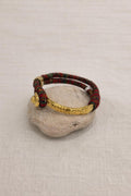 Gold-plated and fabric bracelet. Vintage handcrafted with colorful threads.
