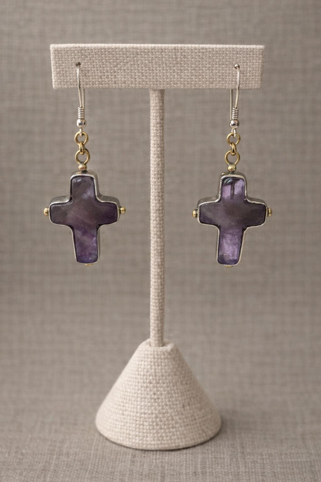 Earrings crafted with genuine amethyst and finished in sterling silver.