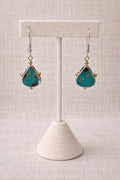 Earrings handcrafted with genuine turquoise and sterling silver.