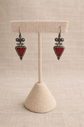 Earrings crafted in sterling silver featuring a striking red triangle with delicate turquoise gemstone accents.
