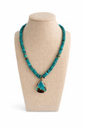 A strand of genuine turquoise beads finished with a turquoise pendant for a beautiful look.